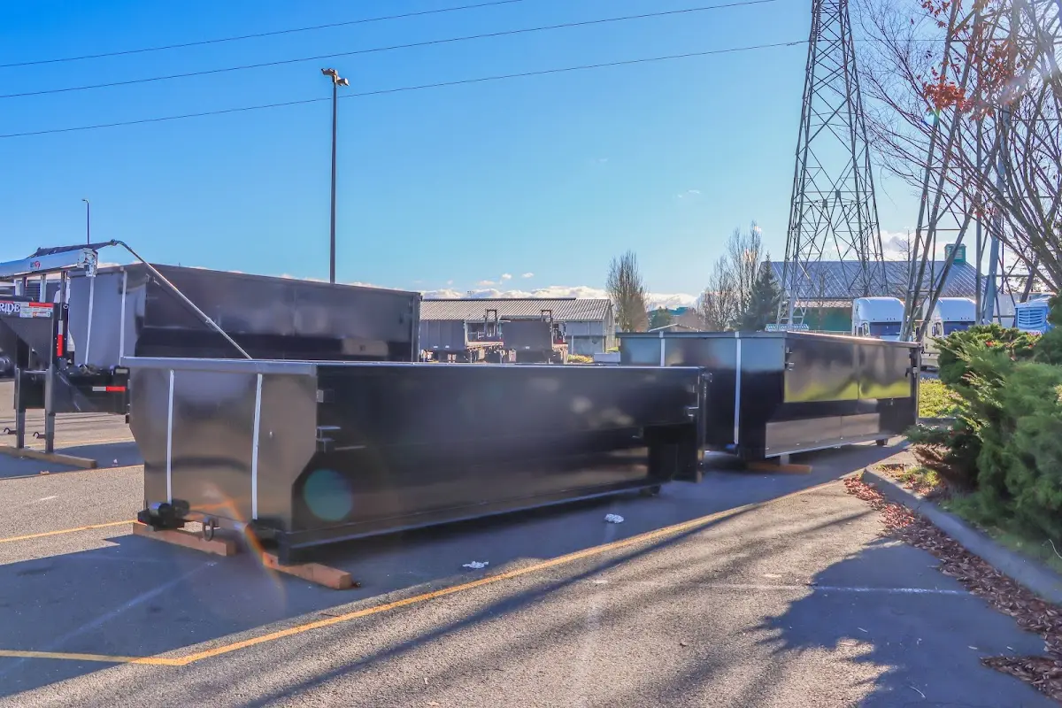 Roll-off dumpster ready for waste disposal at job site for Yard Waste Dumpster Rental in Bridgton